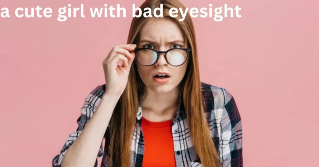 a person holding her glasses