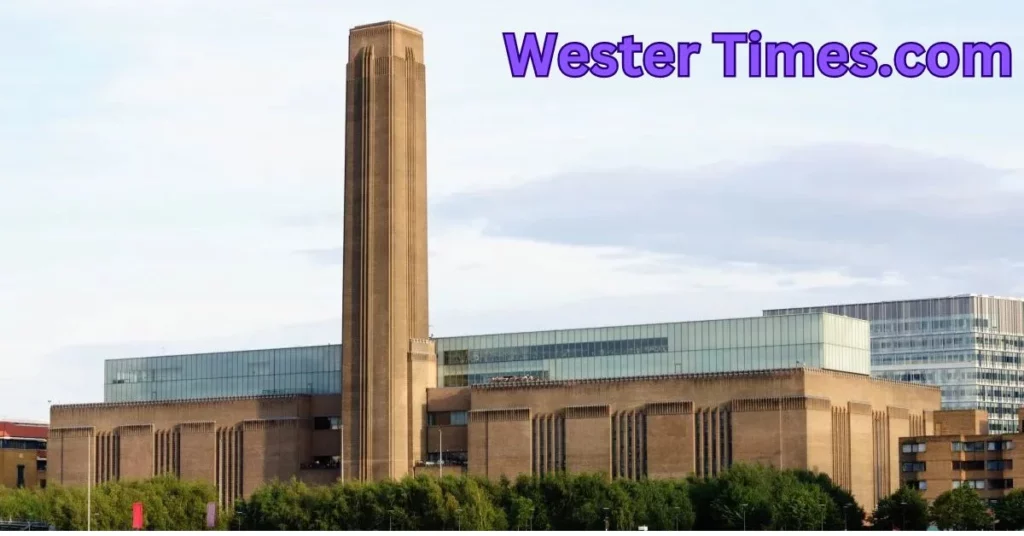 a large building with a tall tower with Tate Modern in the background