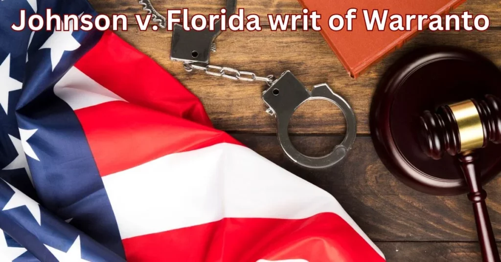 a flag with handcuffs and a gavel on a wooden surface